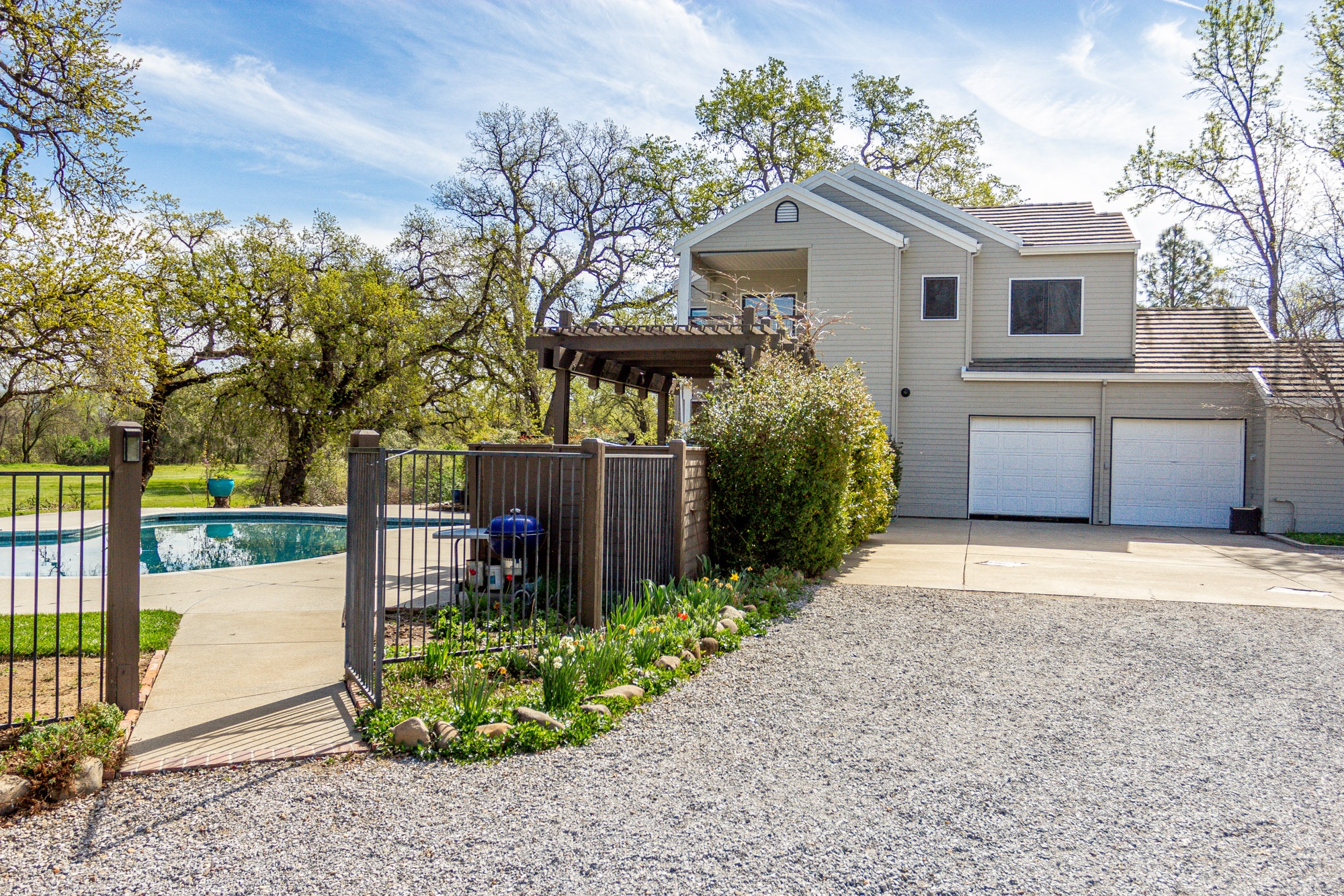 Garage side of house and pool