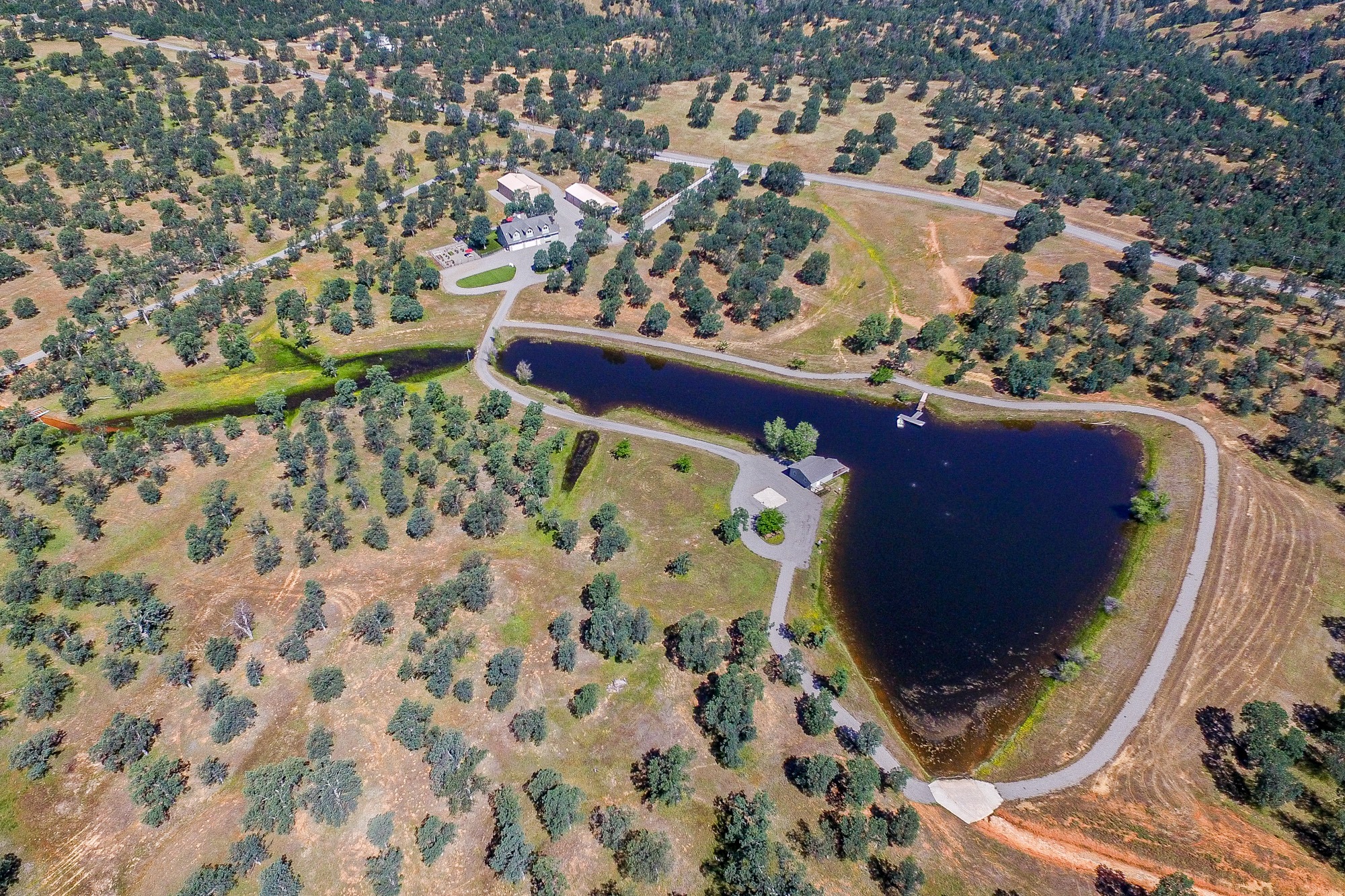 Red Bluff ranch with lake for sale. Beautiful home and fantastic bass fishing lake. Red Bluff, CA.